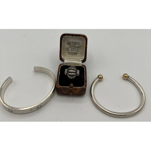 549 - Two silver bracelets and a silver and marcasite ring in vintage ring box. Ring size Q.