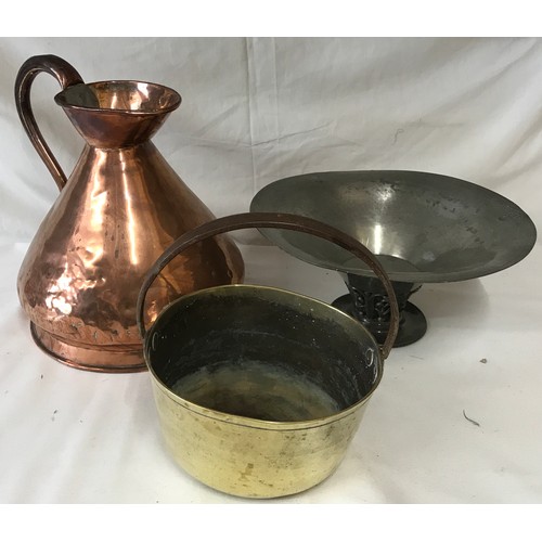 1052 - A collection of copper and pewter items to include a large copper jug and bucket with pewter bowl ma... 