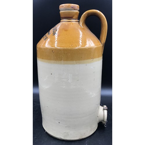 317 - A large stoneware flagon marked 