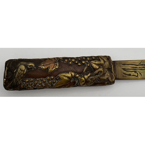 947 - A Japanese copper and brass paper knife. Length 30cm