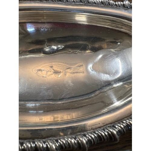 722 - Silver to include a twin handled bowl, Birmingham 1932, makers marks rubbed and a dish raised on fou... 