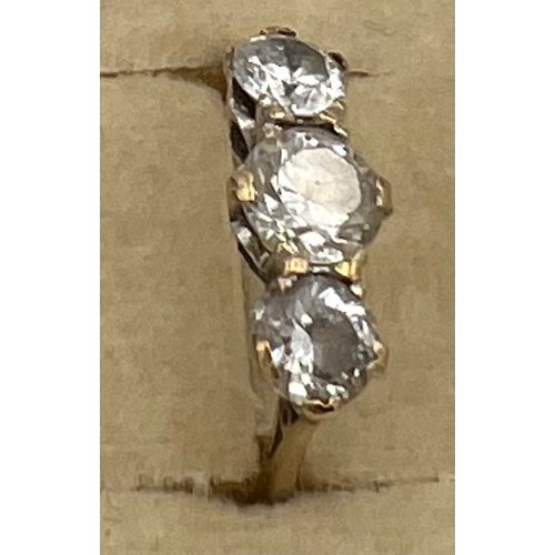 555 - A 9 carat gold ring set with clear stones. Probably white zircon. Size K. Weight 2.2gm.