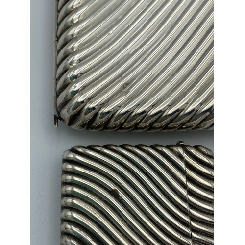 724 - A silver cigarette case London 1893 maker Henry Charles Freeman together with 2 vesta cases, one cas... 