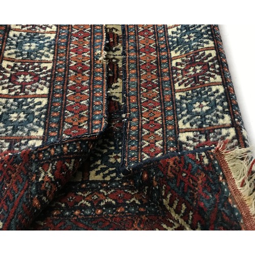 1210 - Oriental style silk rug measuring 90cm x 150cm.