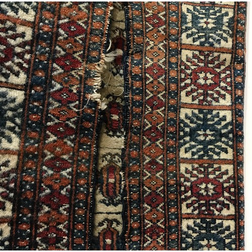 1210 - Oriental style silk rug measuring 90cm x 150cm.