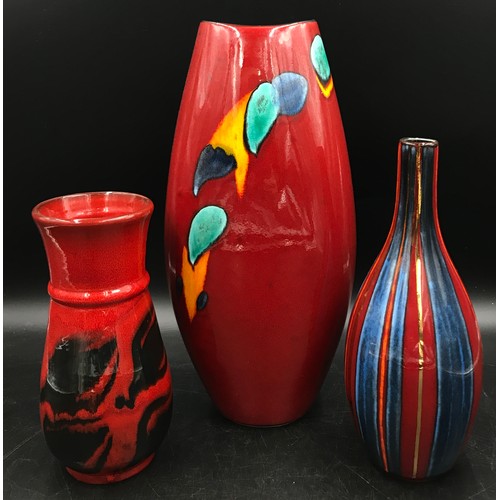 330 - Poole pottery to include three vases of variant heights and patterns tallest 38cm h. Stripy vase by ... 
