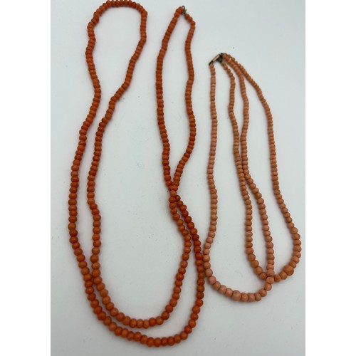 564 - Three strings of coral bead necklaces to include one with 9 carat clasp. Longest measures 114cm leng... 