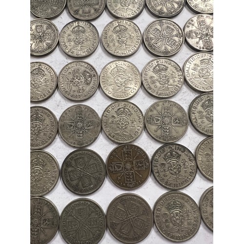 641 - A collection of pre 1946 One Florin and Two Shilling coins. Two coins pre 1919 548.8gm.