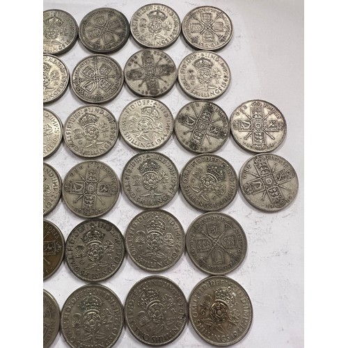 641 - A collection of pre 1946 One Florin and Two Shilling coins. Two coins pre 1919 548.8gm.