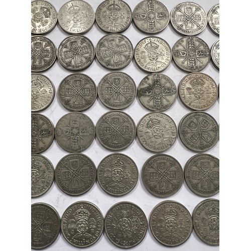 643 - A collection of pre 1946 One Florin and Two Shilling coins. 537.5gm.