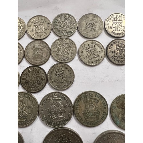 645 - Coins to include mostly pre 1947 Sixpences, One Shillings and post 1947 Two Shillings.