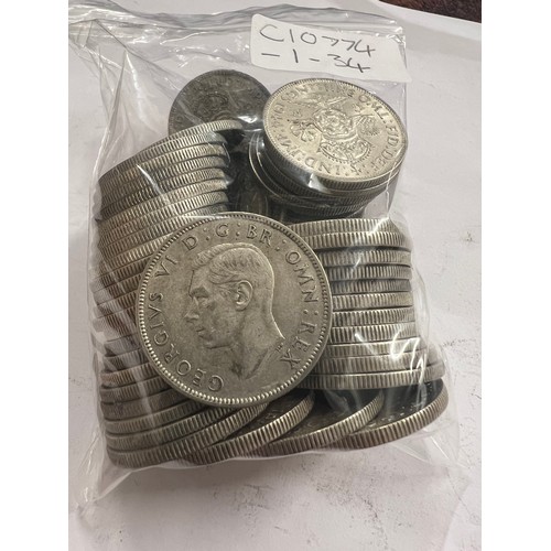 649 - A collection of pre 1946 One Florin and Two Shilling coins. 581.4gm.