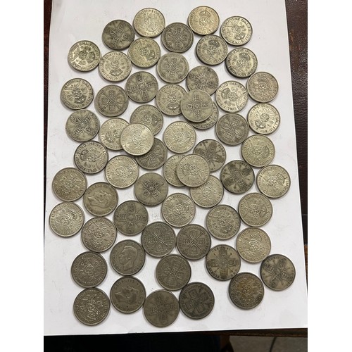 650 - A collection of pre 1946 One Florin and Two Shilling coins. 649.3gm.