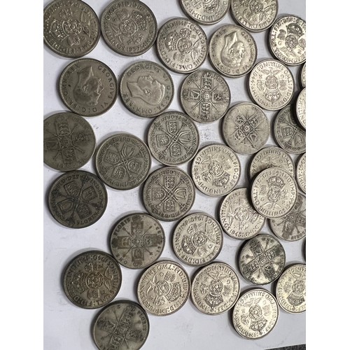 650 - A collection of pre 1946 One Florin and Two Shilling coins. 649.3gm.