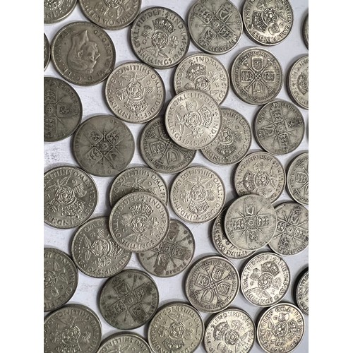 650 - A collection of pre 1946 One Florin and Two Shilling coins. 649.3gm.