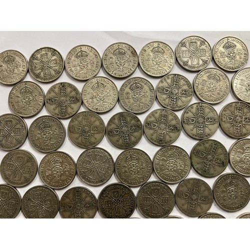 652 - A collection of pre 1946 One Florin and Two Shilling coins. 548.8gm.