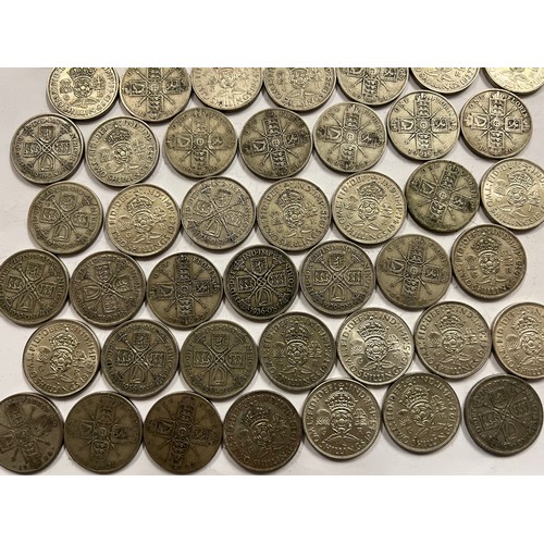 652 - A collection of pre 1946 One Florin and Two Shilling coins. 548.8gm.