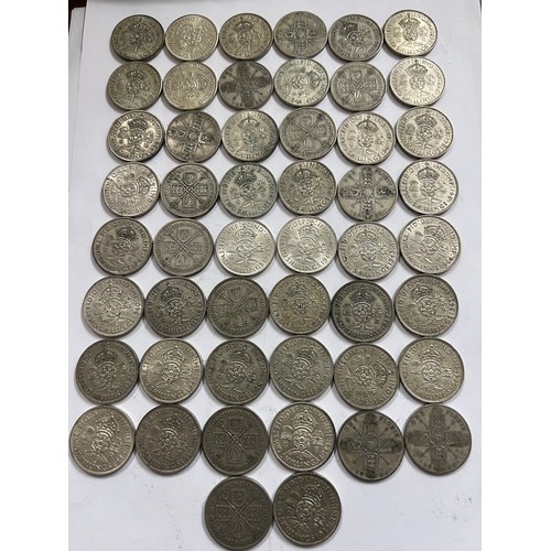 653 - A collection of pre 1946 One Florin and Two Shilling coins. 561.8gm.