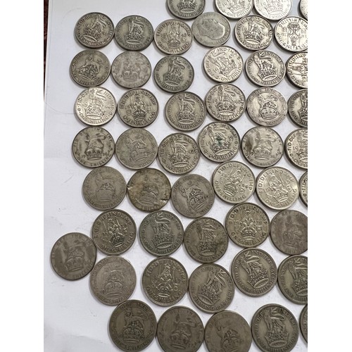 660 - A collection of pre 1946 One Shilling coins. 533.3gm.