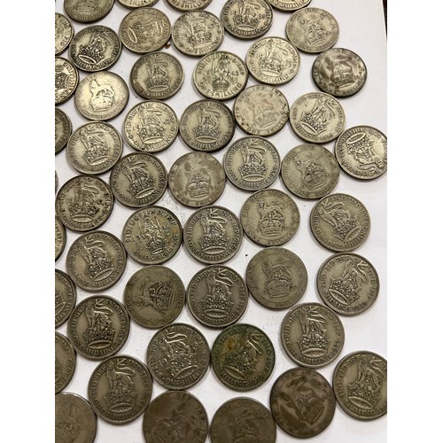 660 - A collection of pre 1946 One Shilling coins. 533.3gm.