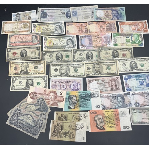 640 - World banknotes to include German occupation notes, Zwanzig Schilling, American Dollars, Australian,... 