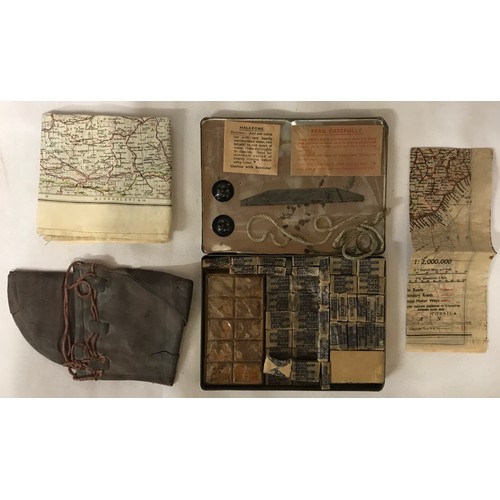 1200 - A WWII RAF silk escape map of France along with a tin containing buttons, halzone, horlicks tablets,... 