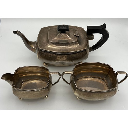 730 - A three-piece silver tea service comprising teapot, milk and sugar, Chester 1930 maker S Blanckensee... 