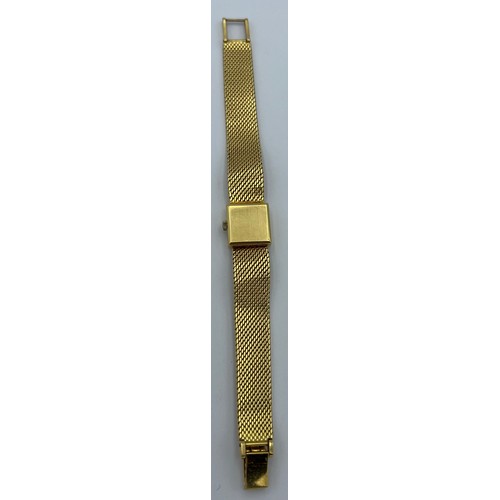 983 - A ladies 18 carat yellow gold Omega wristwatch. Total weight 37.8gm.