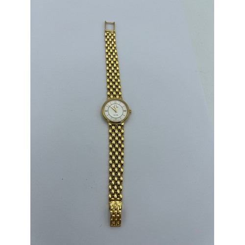 984 - An Omega De Ville 18 carat yellow gold ladies wristwatch. De Ville logo to back and serial number 56... 