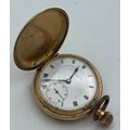 Gold plated hunter pocket watch. 5cm diameter. Thomas Russell and son Liverpool. White enamel dial w... 