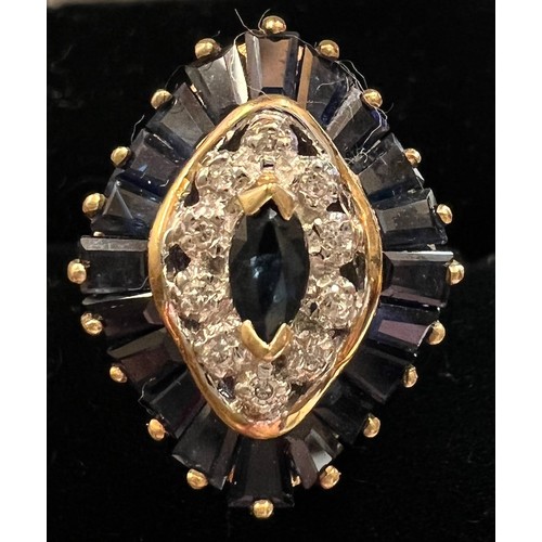 577 - A nine carat gold ring set with baguette cut sapphires and diamonds. Size M, weight 3.9gm.