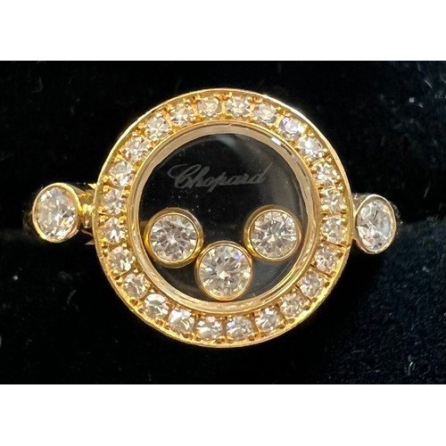 578 - An 18 carat Chopard ‘Happy Diamonds” diamond ring, the round bezel set with three floating brilliant... 