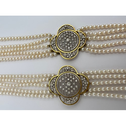 580 - A quintuple strand seed pearl choker necklace with pierced 18 carat gold, platinum and diamond set c... 