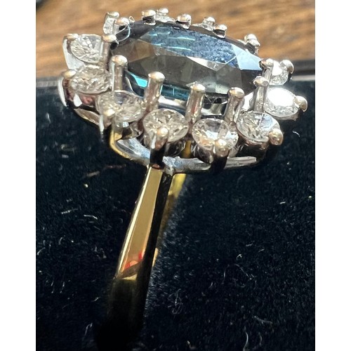 584 - Sapphire and diamond cluster ring with 18 carat gold shank. Size M. Weight 4.6m.