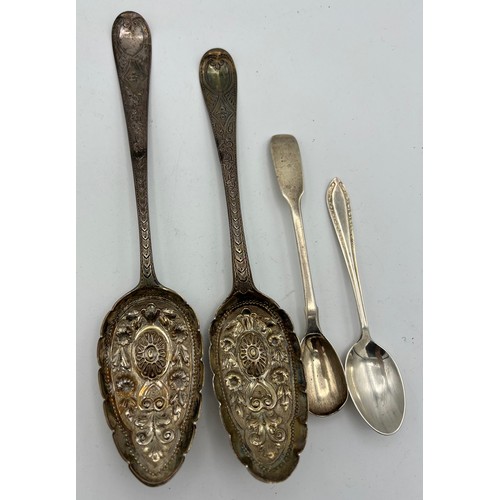 735 - Silver spoons to include two bottom marked tablespoons with later decoration, one maker Hester Batem... 