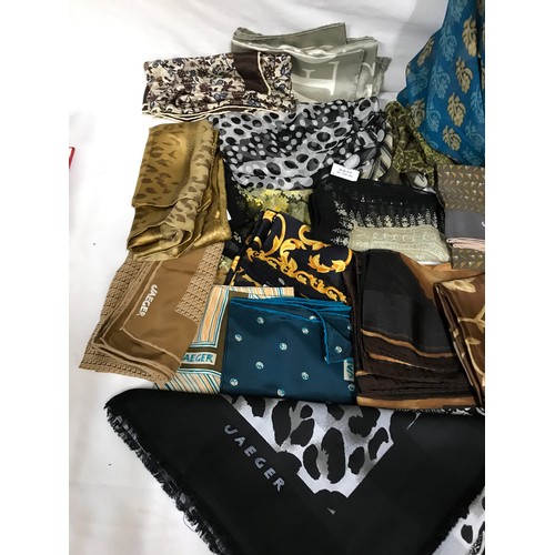 932 - A large collection of Jaeger scarves mixed sizes and colours, largest 135cm square, smallest 59cm sq... 