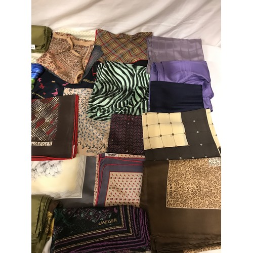 932 - A large collection of Jaeger scarves mixed sizes and colours, largest 135cm square, smallest 59cm sq... 