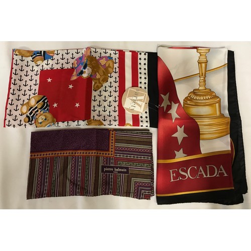 933 - Two silk scarves to include Escada 87cm square, in original box, and Pierre Balmain 67cm square alon... 