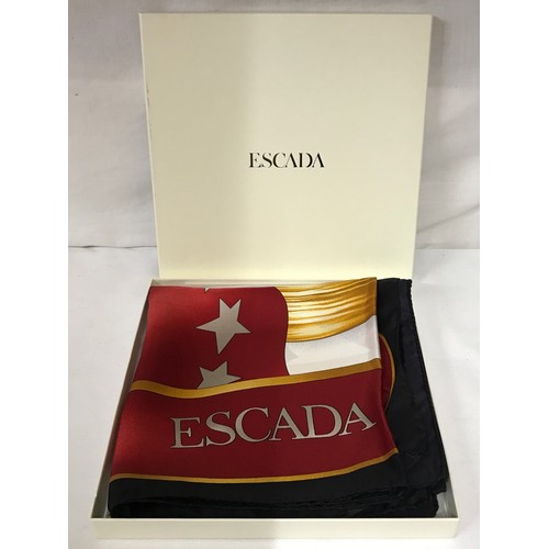 933 - Two silk scarves to include Escada 87cm square, in original box, and Pierre Balmain 67cm square alon... 