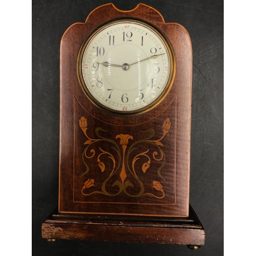 1195 - Inlaid mahogany mantle clock in the Art Nouveau style, 24 h x 16cm w, on four brass feet.