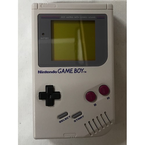 827 - A Nintendo Gameboy, compact video game system with Tetris, leads, in original box.