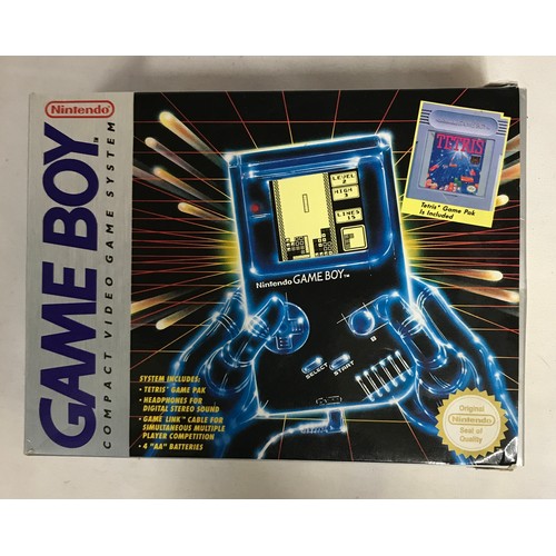 827 - A Nintendo Gameboy, compact video game system with Tetris, leads, in original box.