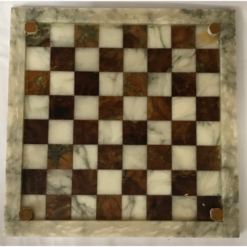 829 - Onyx chess board and pieces, board 36cm square, King 7cm h. Pieces in a Simmers Biscuit Tin.