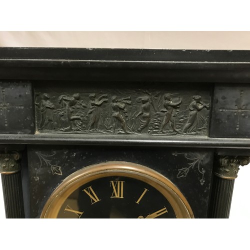 1193 - A Victorian slate mantle clock with column supports. 
With pendulum.