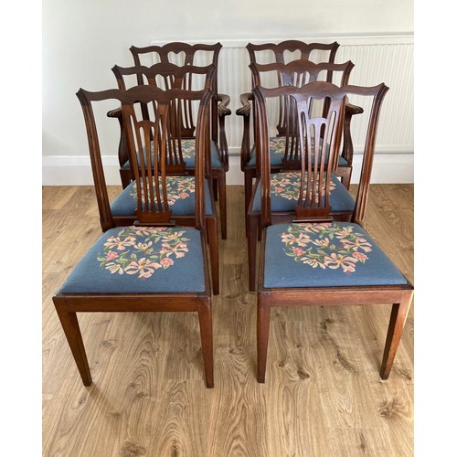 86 - A set of six mahogany dining chairs to include 2 carvers with needlework drop in seat covers.