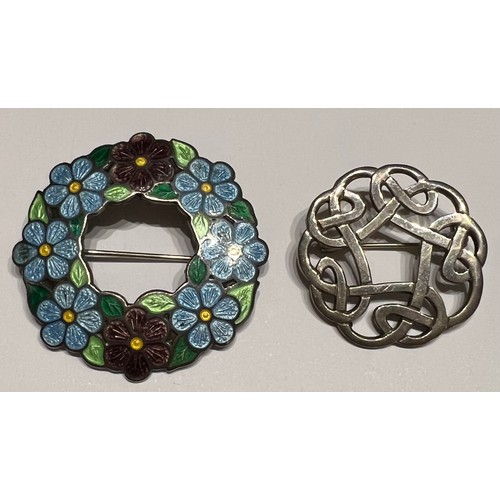 569 - Two brooches, one silver and enamel 1946 maker AH Darby and son.