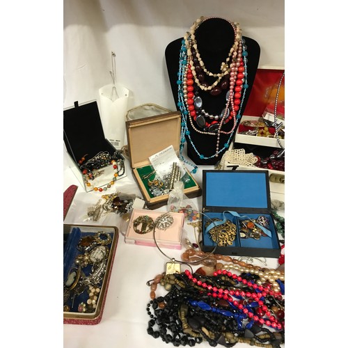 469 - Large collection of costume jewellery to include necklaces, earrings, brooches, beads etc