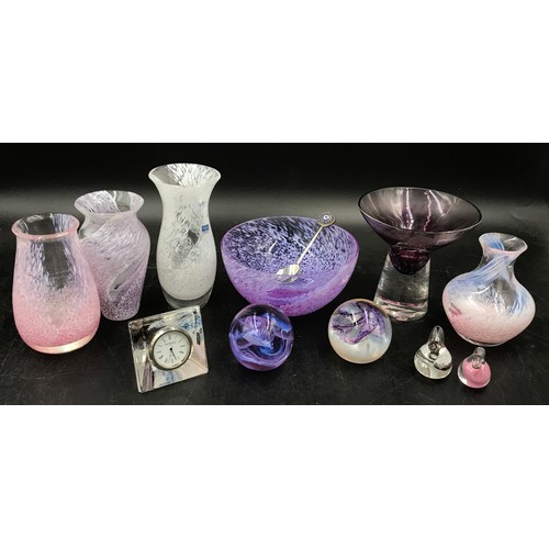 401 - A selection of Caithness glass to include four vases, a bowl, a candle holder, a clock, a small spoo... 