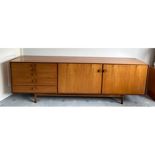 113 - A large G-Plan 1960's retro vintage stained teak wood sideboard credenza comprising of a bank of fiv... 