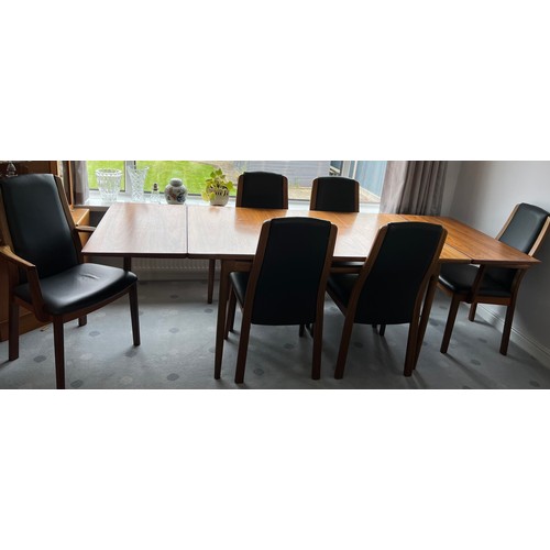 114 - G Plan dining table and six leather covered chairs including 2 carvers. Table extended 244cm l x 89c... 